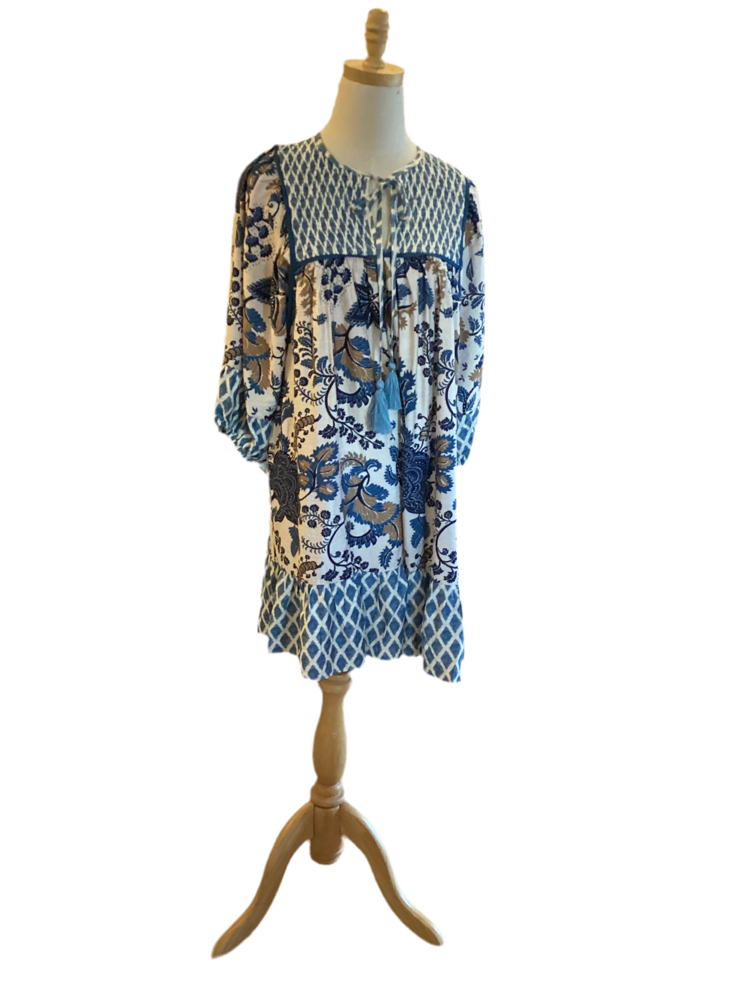 Umgee blue mixed pattern dress with 3/4 puff sleeve.