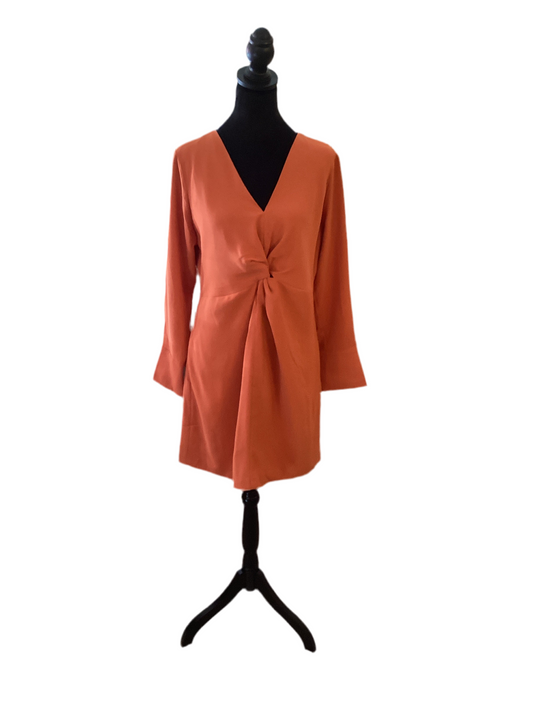Jodifl orange, long sleeve dress with knot in front