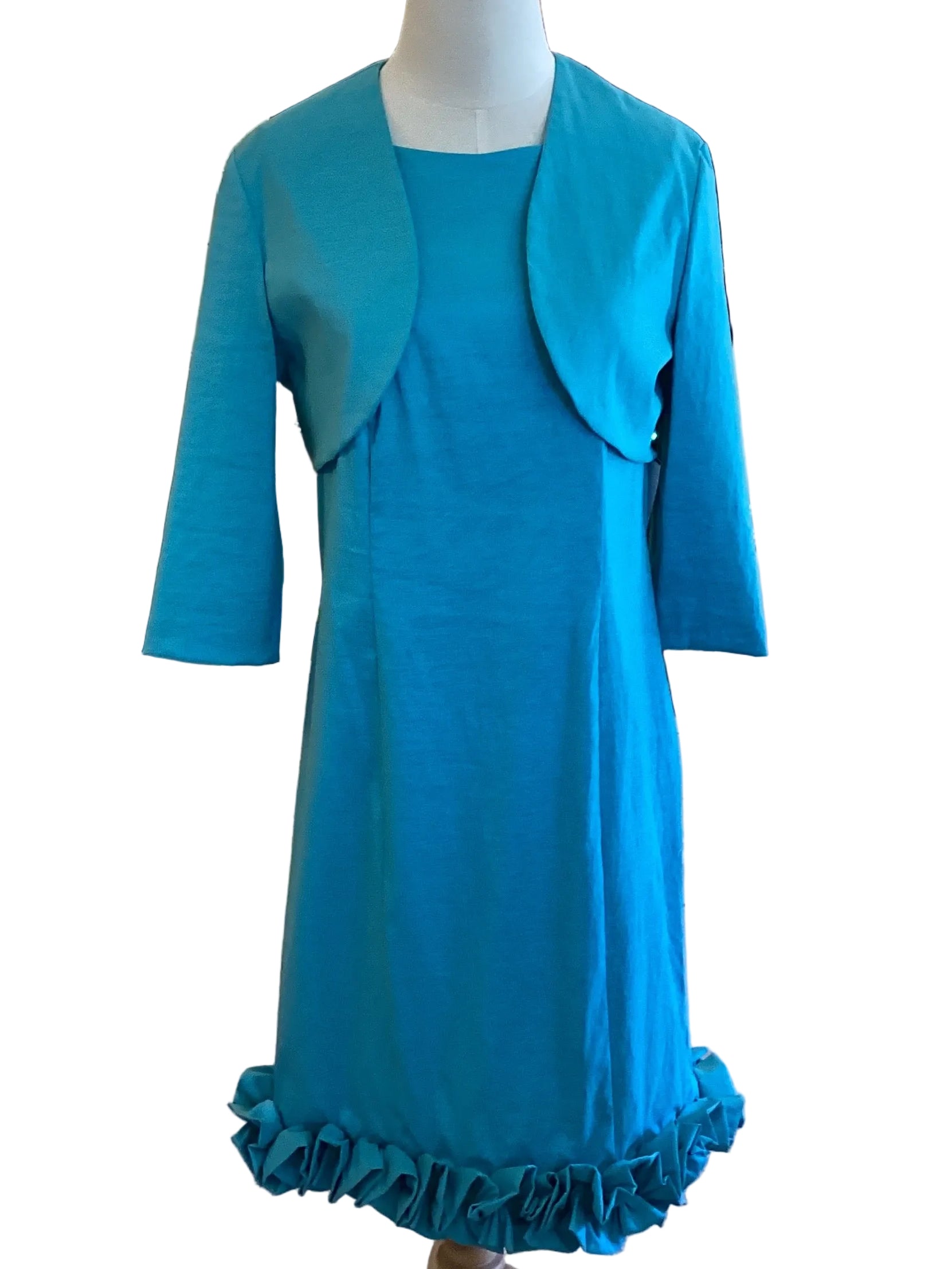 Joseph Ribkoff light teal sleeveless dress with bottom ruffle and 3/4 sleeve shrug