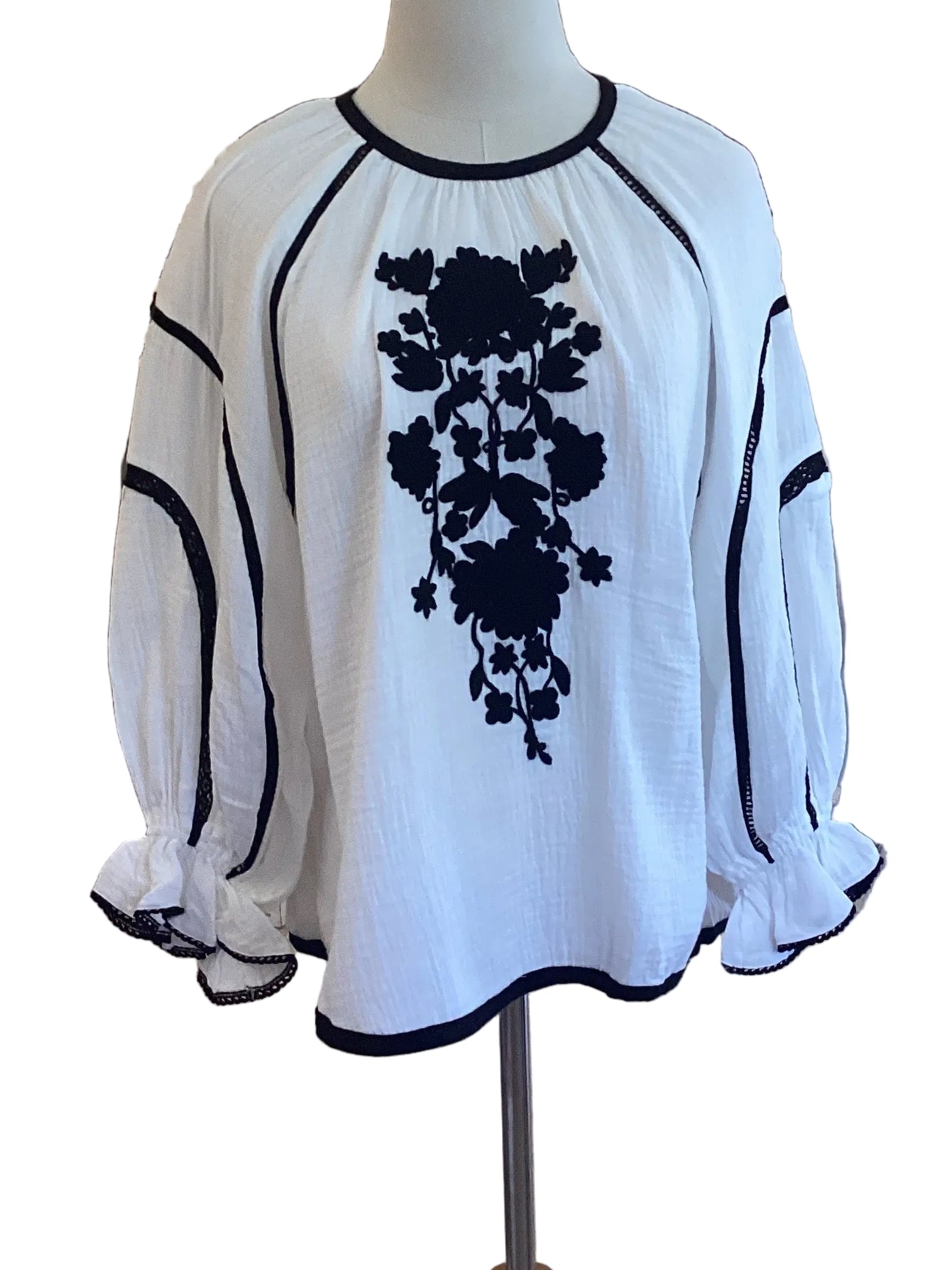 See and be seen ivory top with black appliqué and trim
