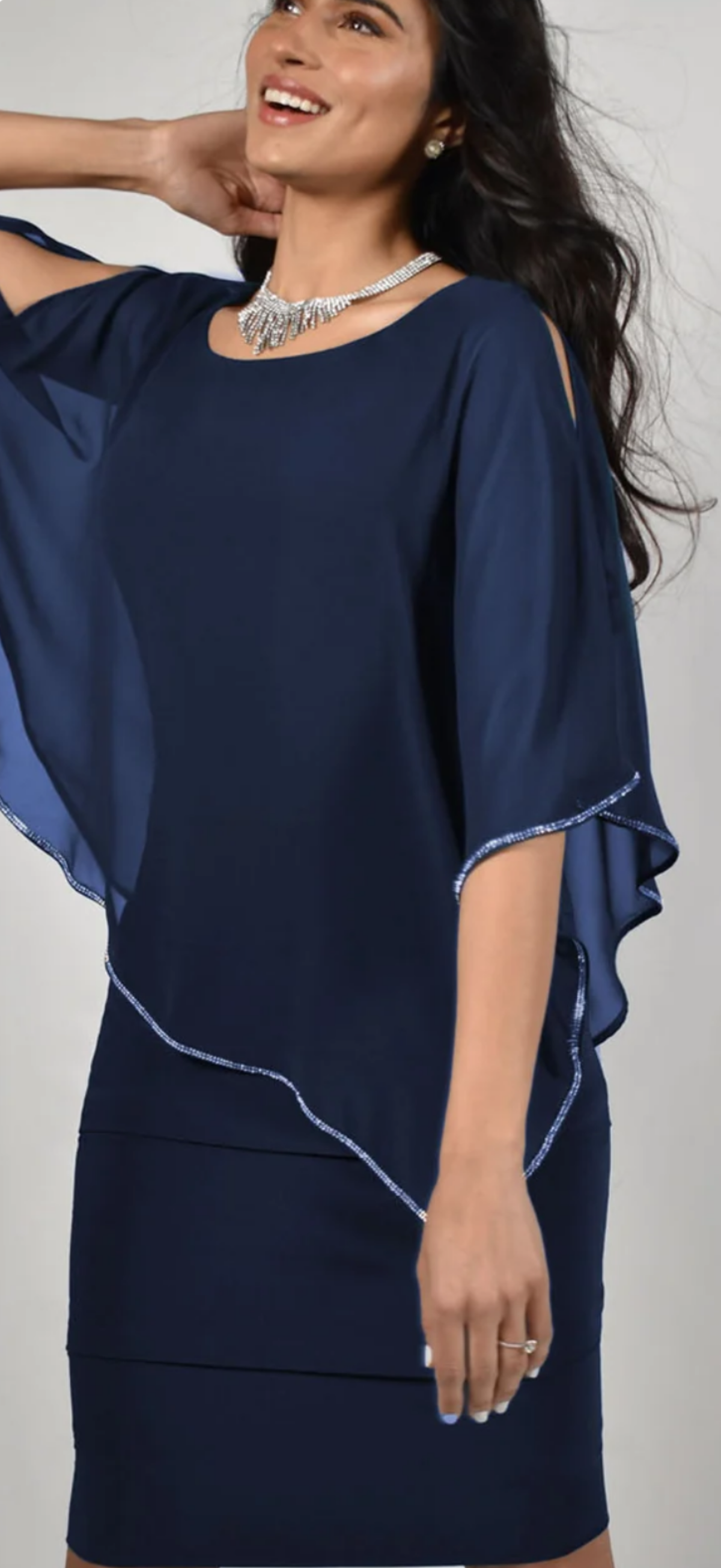 Frank Lyman midnight blue dress with sheer overlay and rhinestone handkerchief hem
