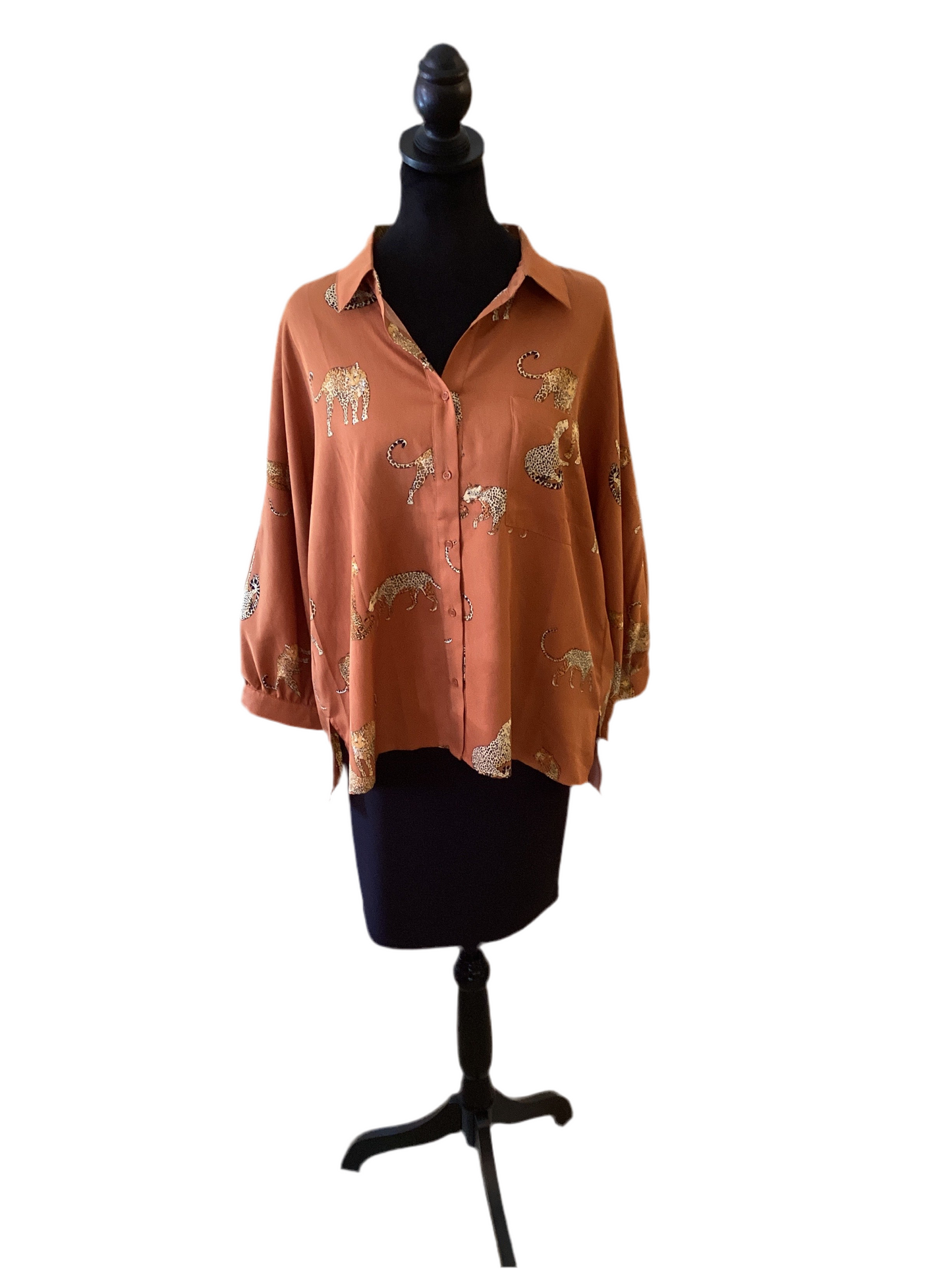 orange button up long sleeve animal print shirt