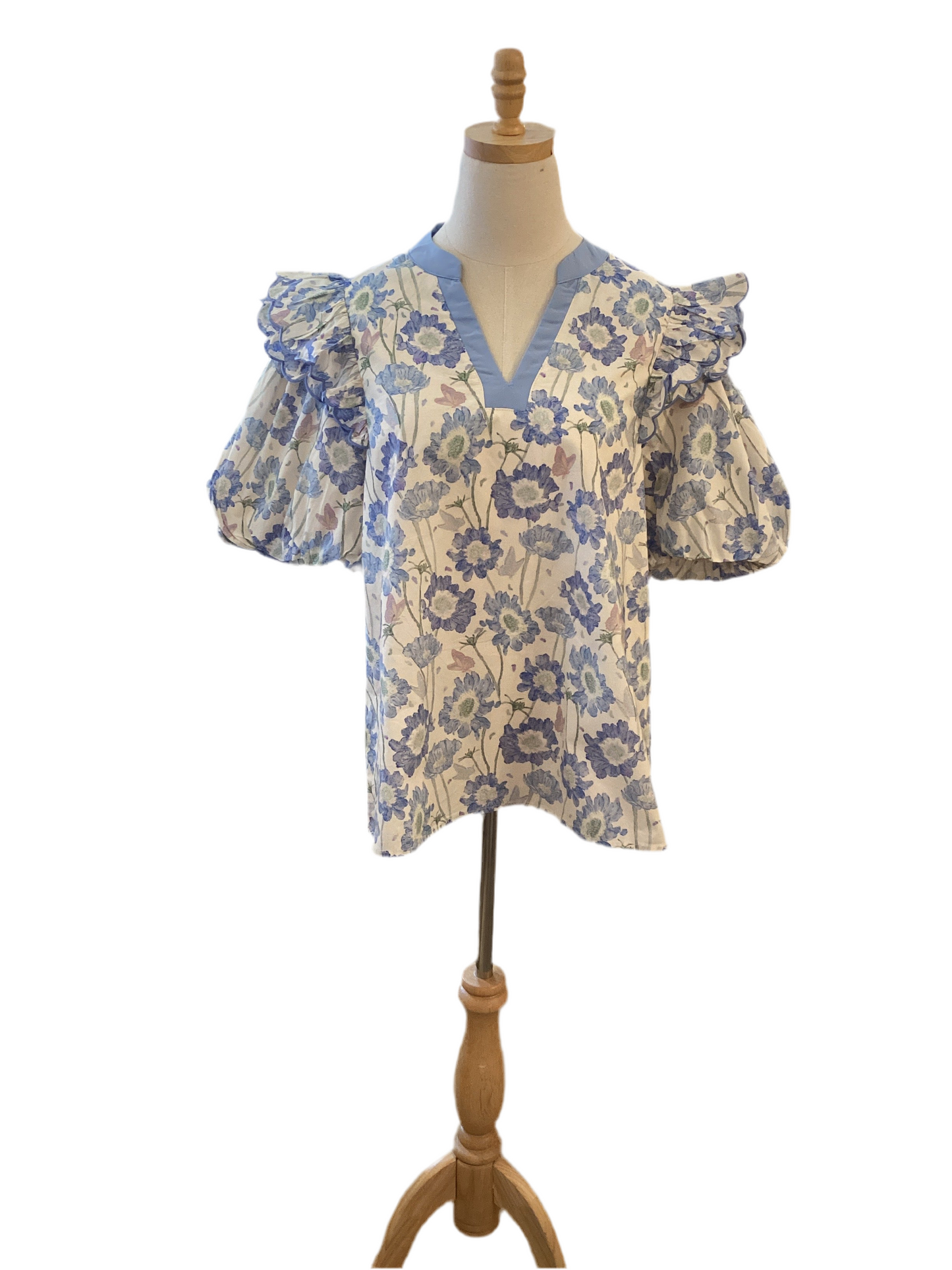 ￼Jodifl light blue floral top with solid blue trim