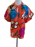 Gigio orange multi color flower top with trimmed v neck and puff sleeve
